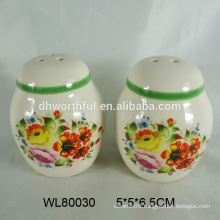 Colorful ceramic salt and pepper shaker with full decal